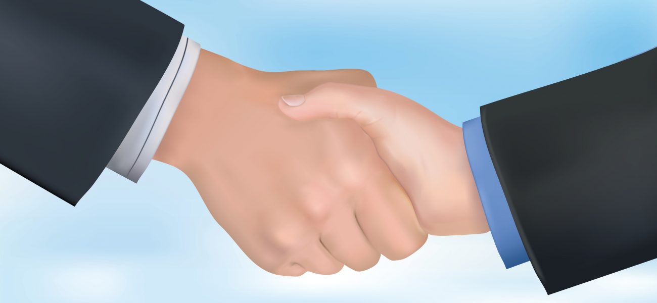 Handshake. Behind is a light blue background