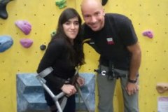 Zubee standing next to her instructor